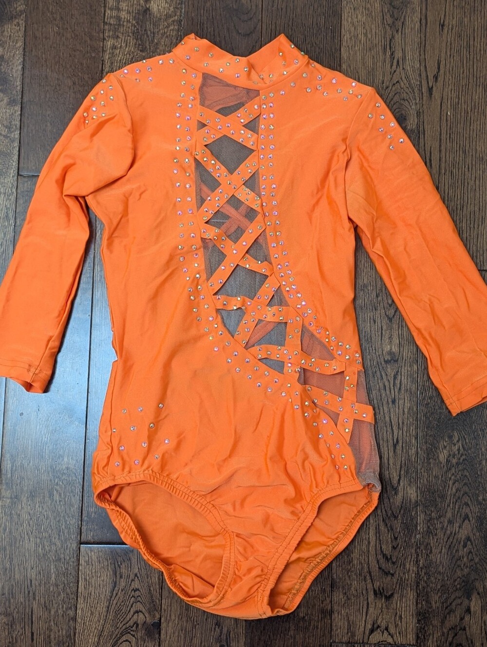Bright orange dance leotard with rhinestones